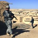 U.S. Soldier Provides Security for Afghan Police Patrol in Afghanistan