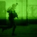 U.S. Army Cavalry Scout Rushes Toward House in Night Raid in Narhwan, Iraq