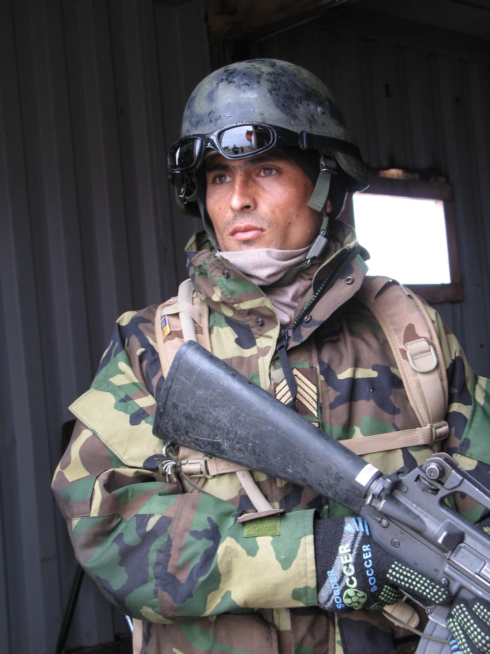 Afghan Army Sergeant Major Provides Security During U.S. Advisor Training