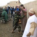 Afghan Soldier Conducts Search During U.S. Advisor Training