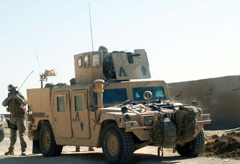 Marines Engage Taliban Fighters in Helmand Province Village