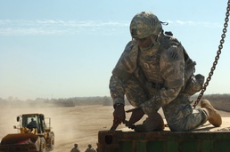 Army Platoon Leader Moves Supplies to Patrol Base in Iraq