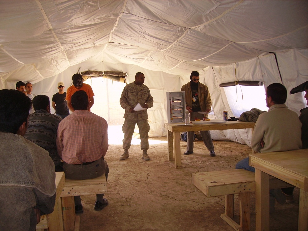 Air Force Tech. Sgt. Instructs Electrical Panel Class at Village of Hope