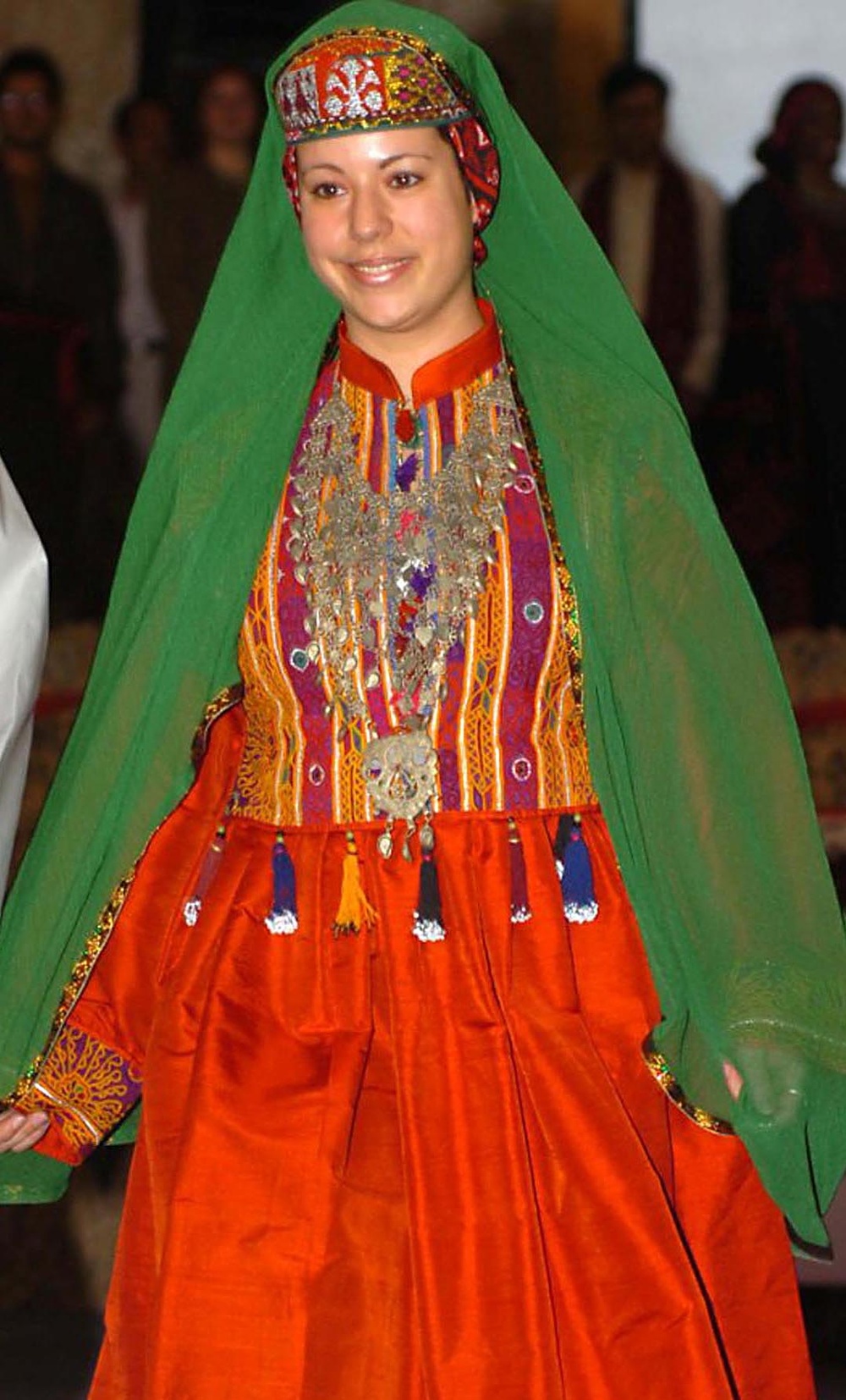 U.S. Servicemember Walks Runway in Afghan Dress for International Women's Day