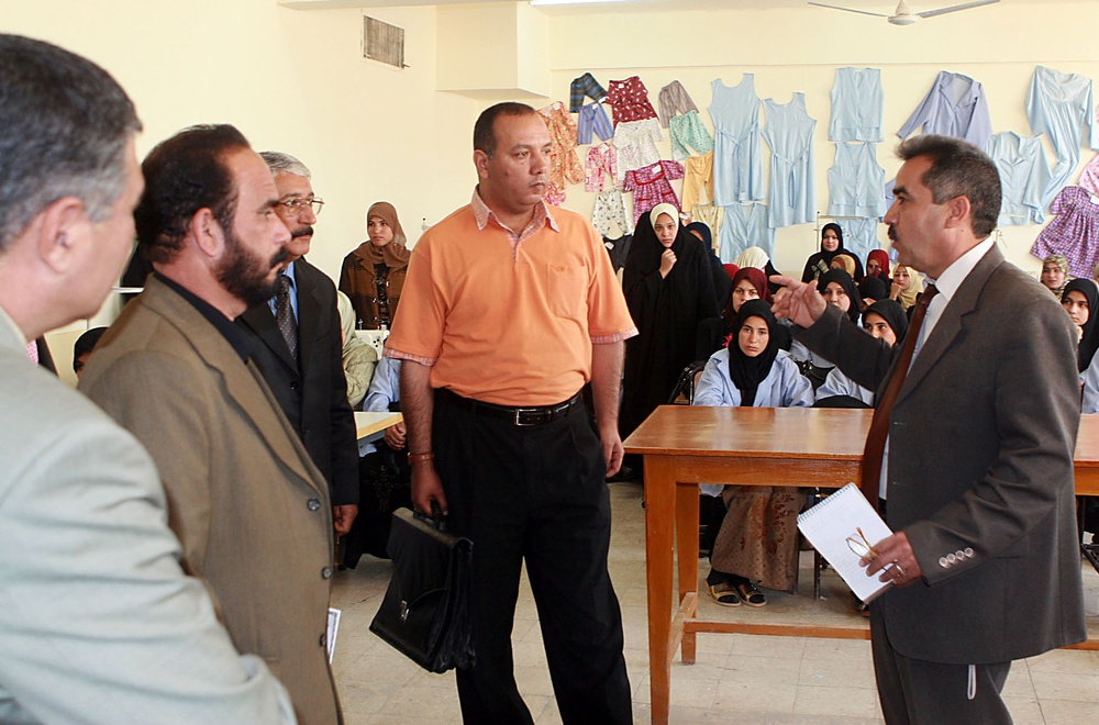 Iraqi Officials Tour Vocational School, Observe Women's Sewing Class