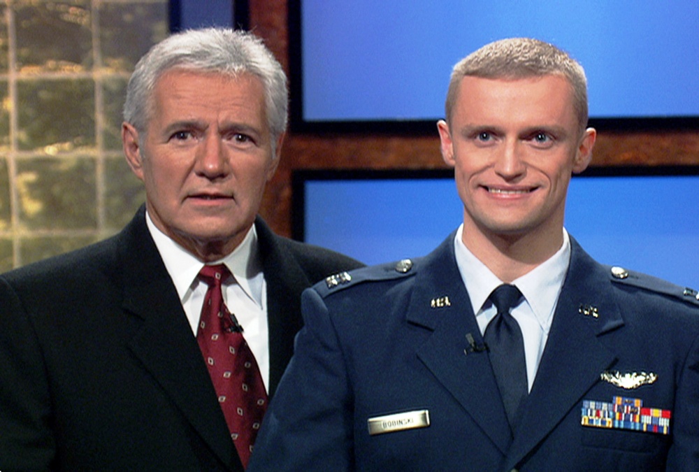 Jeopardy! Host Alex Trebek Poses with Air Force Capt. Timothy Bobinski on Game Show Set