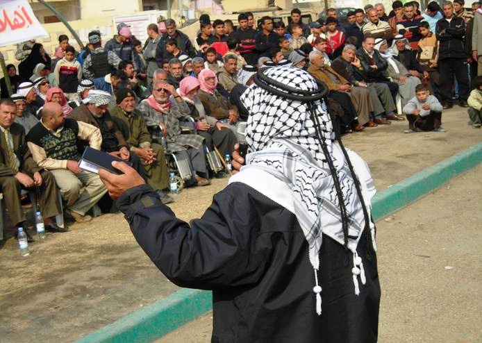 Sheik Welcomes Displaced Iraqi Families Back to Baghdad Neighborhood