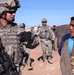U.S. Army Sergeant Connects with Iraqi Children During Mission