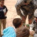 Army Medic Provides Medical Care to Afghan Child During Outreach Event