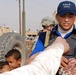 Soldiers and Police Distribute Local Newspaper in Iraq