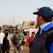 Soldier Connects with Local Children During Joint Patrol in Iraq
