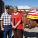 Grieving Parents Honor Fallen Son in Homecoming Parade