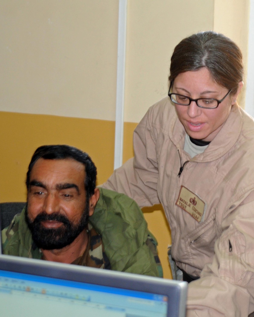 Air Force Tech. Sgt. Mentors Afghan Colonel on Computer Skills