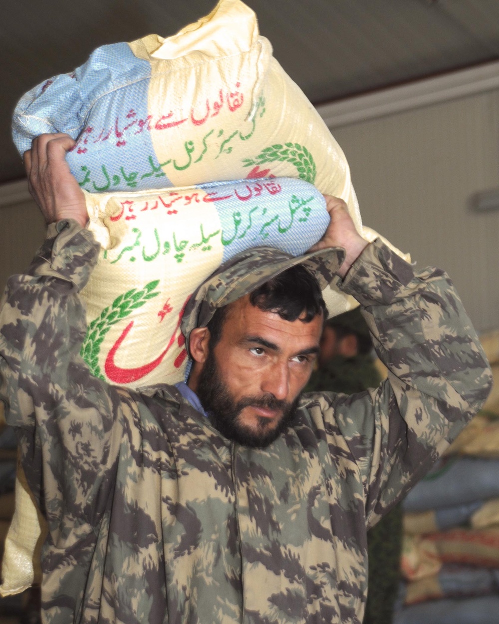 Afghan Army Distributes Food Supplies in Kabul