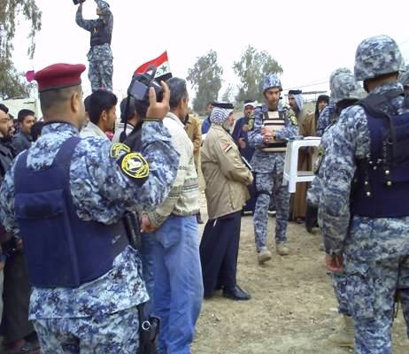 Iraqi Police, U.S. Troops Collaborate on Security Checkpoints in Tameem