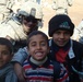 Soldier Connects with Iraqi Children on Patrol