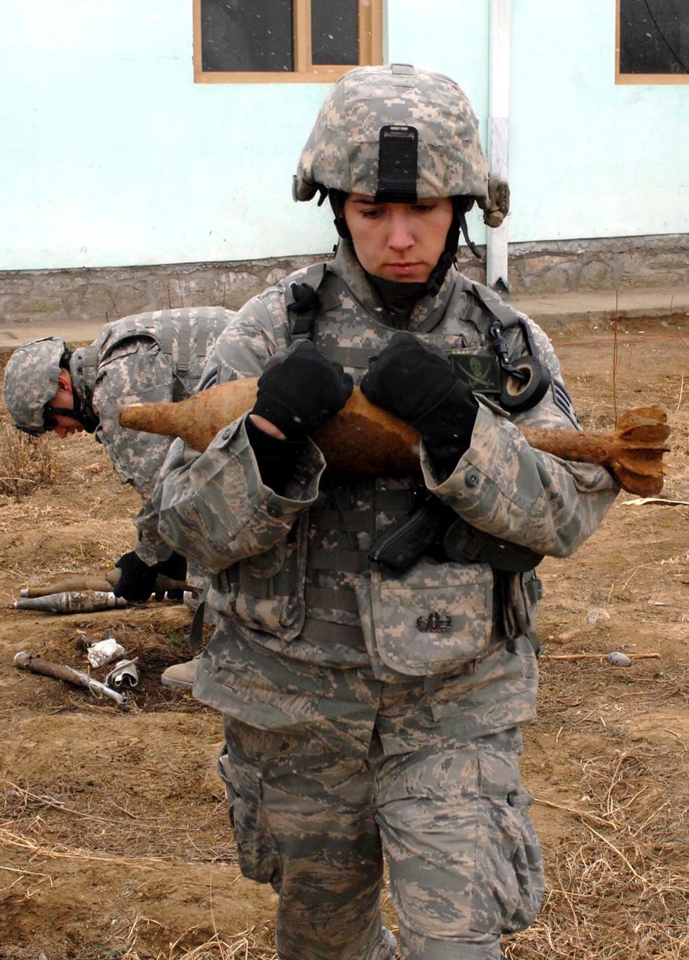 Air Force Airman Handles Unexploded Ordnance