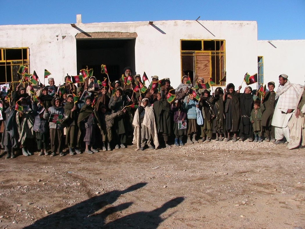 Afghan School Reopens with New Flags, Supplies