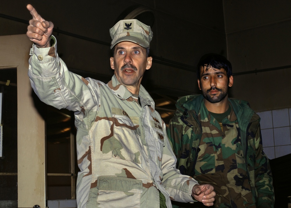 U.S. Navy Petty Officer Mentors Afghan National Army on Food Service Improvements