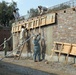 Afghan Workers Construct Building at Forward Operating Base Fenty