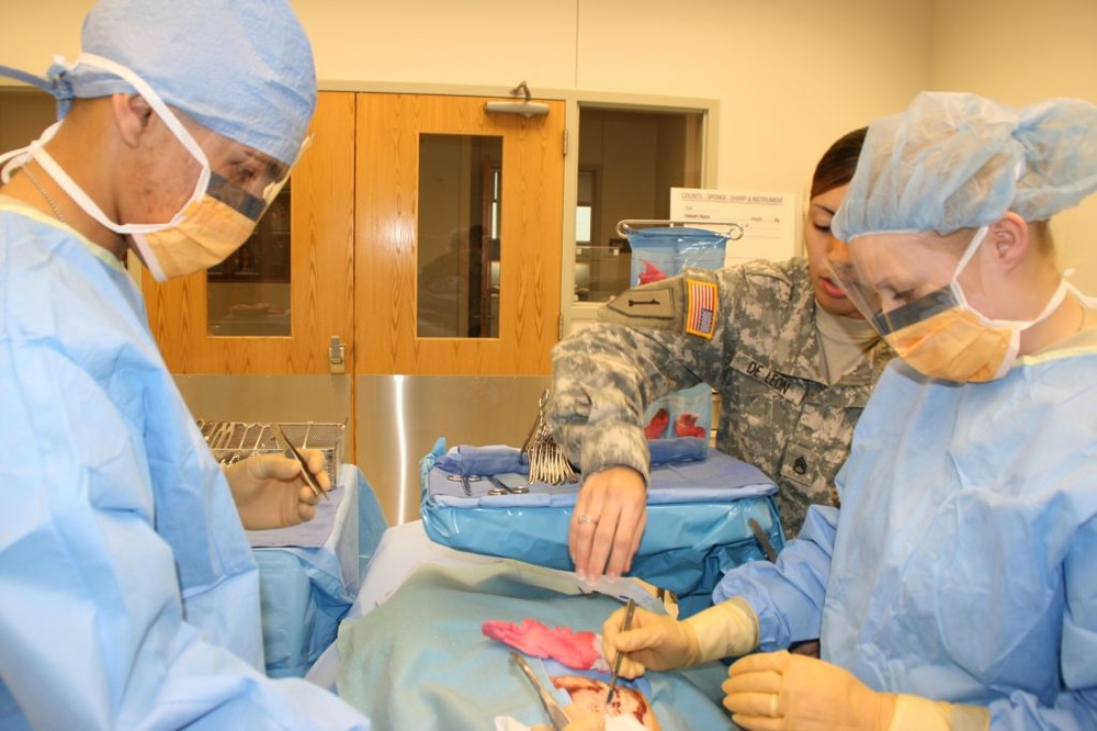 Army Trainees Practice Appendectomy Under Instructor's Watchful Eye