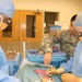 Army Trainees Practice Appendectomy Under Instructor's Watchful Eye