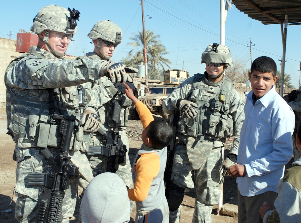 Soldiers Engage with Iraqi Children in Baghdad