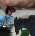 Tech. Sgt. Sommers Paints to Help Children's Heart Surgeries
