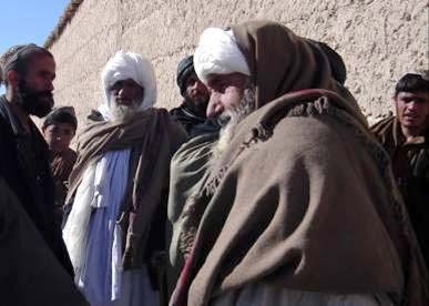 Afghan, Coalition Forces Deliver Food Aid to Snow-Bound Village