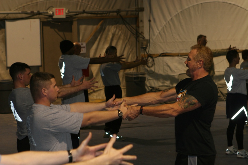 Diamond Dallas Page Leads Yoga Session for Troops in Afghanistan