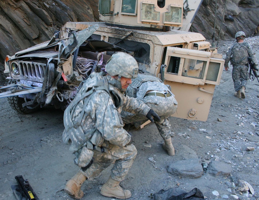 Army Warrant Officer Repairs Damaged Vehicle in Afghanistan