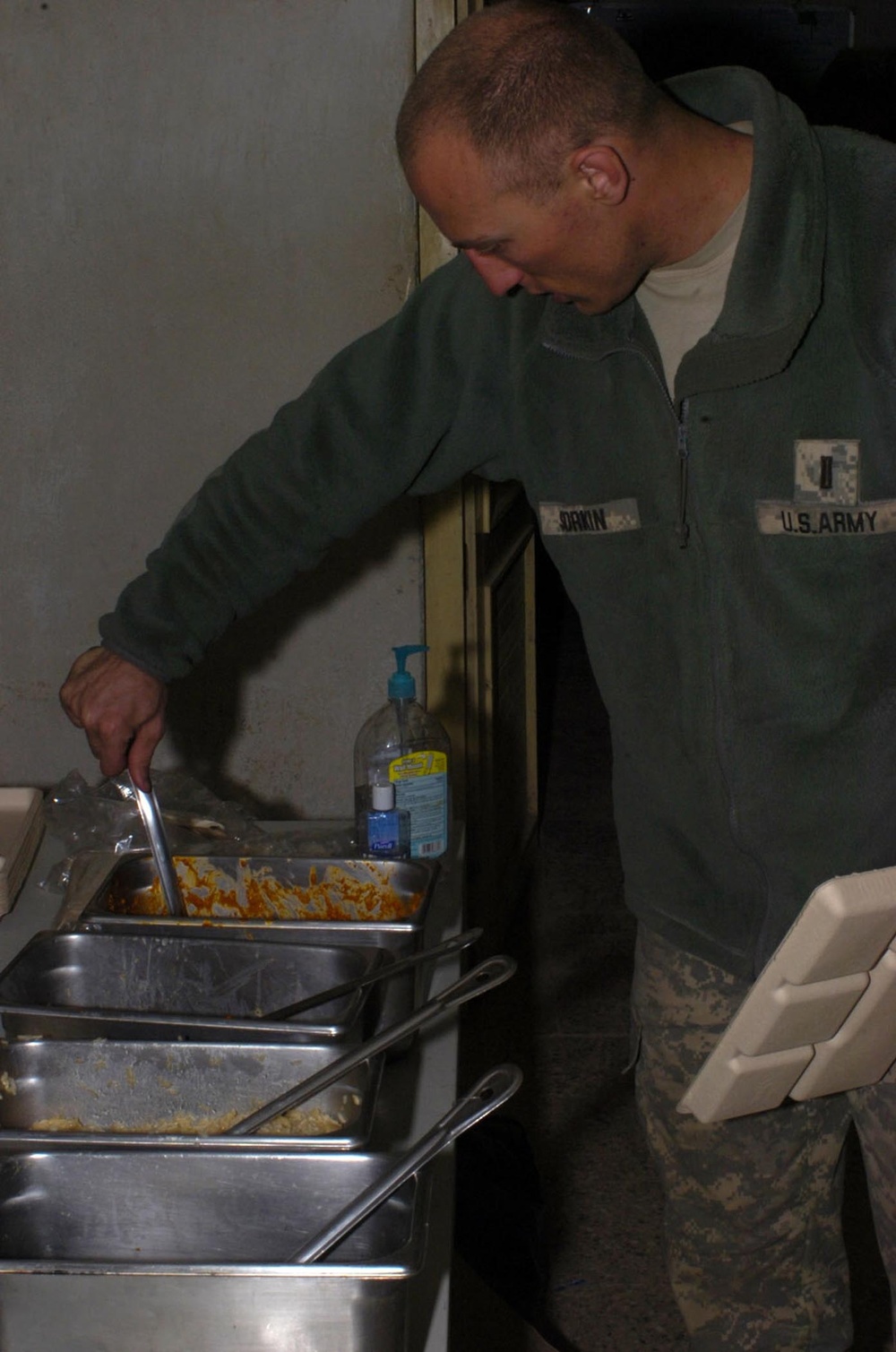 Army Officer Enjoys Meal at Firebase Nawa in Afghanistan