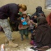Army Medic Provides Deworming Treatment to Afghan Child