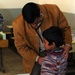 Iraqi Doctor Provides Medical Care to Boy at Baghdad School
