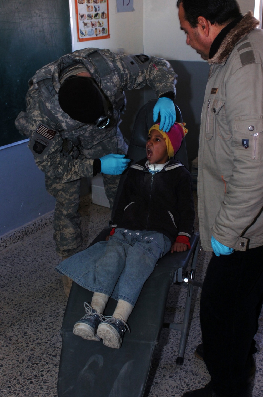 U.S. Army Dentist Provides Care to Iraqi Child