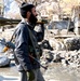 Afghan Police Officer Patrols with Rocket-Propelled Grenades