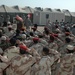 Trainees Salute Iraqi Flag at Welcoming Ceremony for New NCO Academy