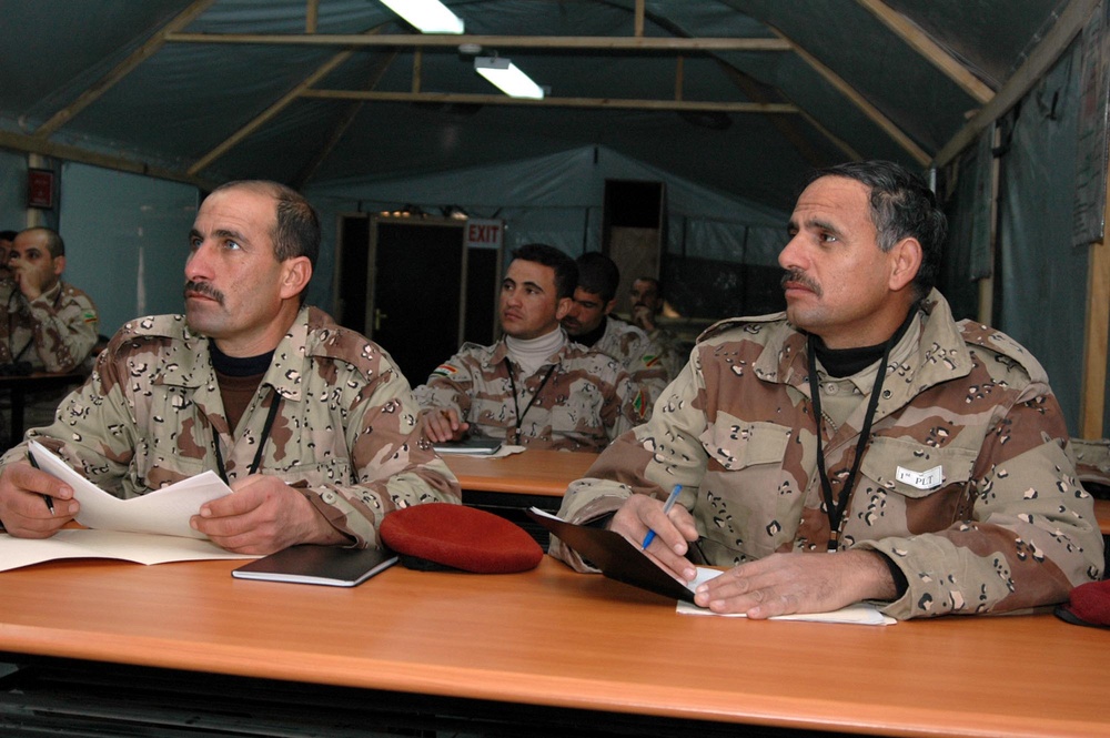 Iraqi Soldiers Train at U.S.-Led Academy in Iraq