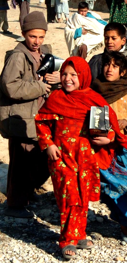 Afghan Girl Receives Aid from International Forces