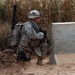 Soldier Seeks Cover After Sniper Attack in Iraq