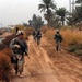 Mortarmen Patrol Road Near Pump Station in Iraq