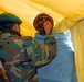 Afghan Soldier Provides Medical Aid to Villager
