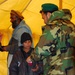 Afghan Army Captain Provides Medical Aid to Local Boy