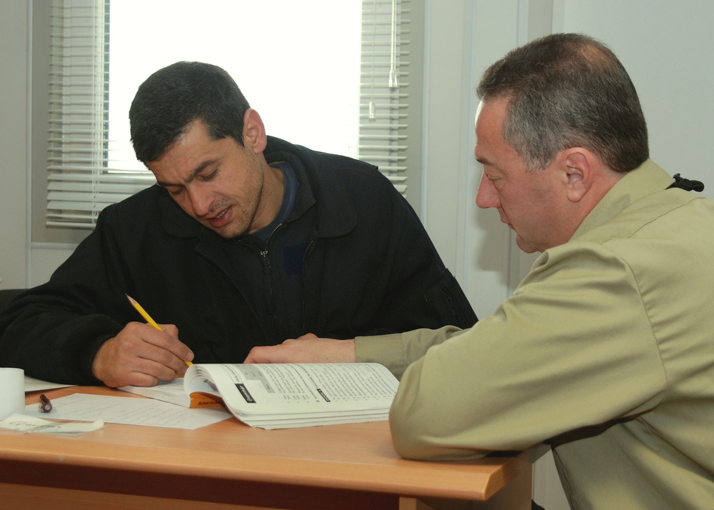Afghan Air Force Trainee Receives English Lessons from U.S. Contractor