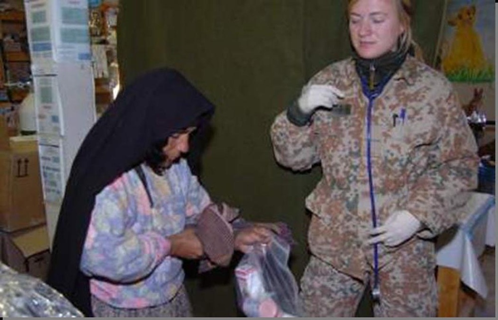 Afghan Woman Receives Medical Care from Coalition Forces