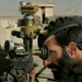 Afghan Army Sergeant Sights D-30 Howitzer at Forward Operating Base