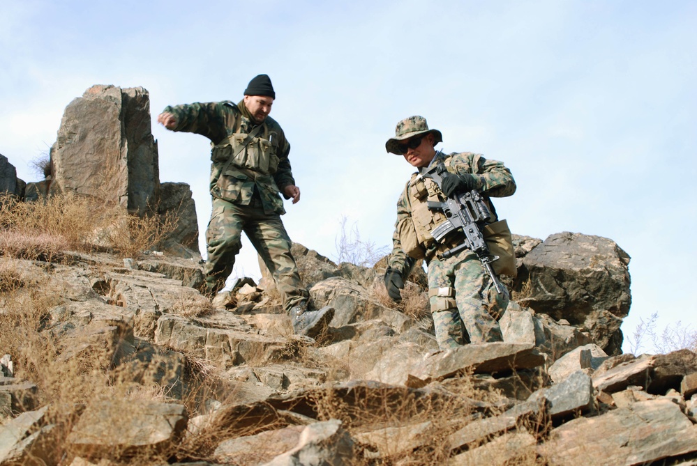 U.S. Sailor and Afghan Army Officer Descend Mountain Observation Post