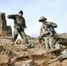 U.S. Sailor and Afghan Army Officer Descend Mountain Observation Post