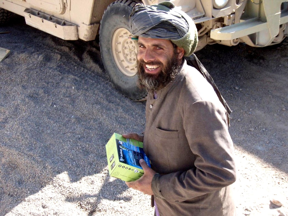 Afghan Villager Receives Radio, Free Health Care from Afghan Army