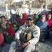 Afghan Police Officer Distributes Toys to Children in Nangarhar Province